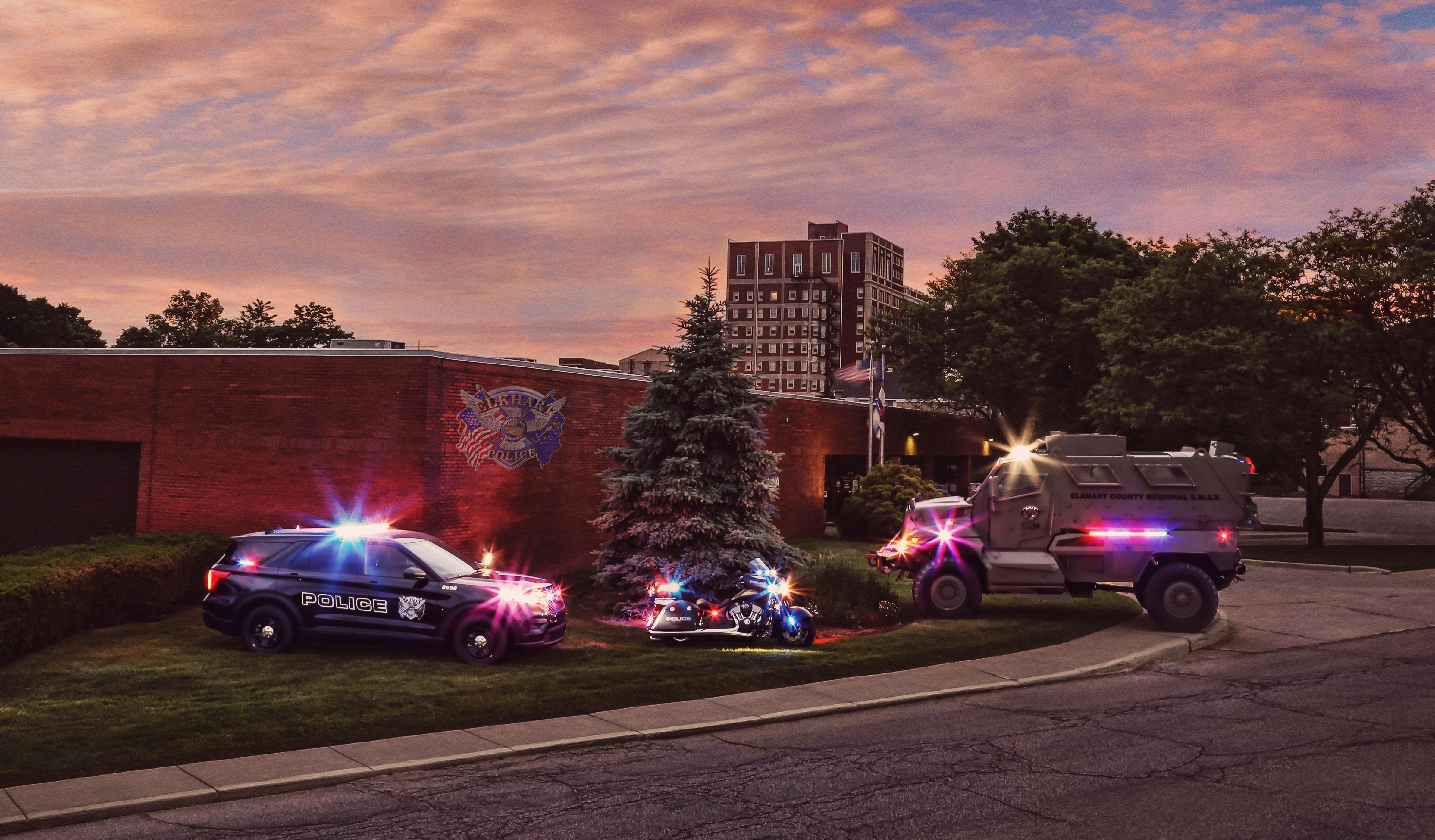 Elkhart Police Department at Night with Department Vehicles