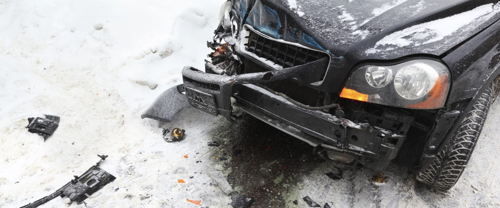 photo of a car damaged by a winter crash