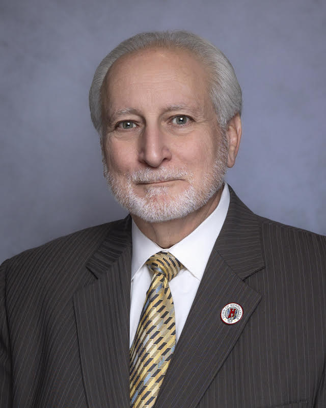 Councilman Rick Bella Poses for a Photo