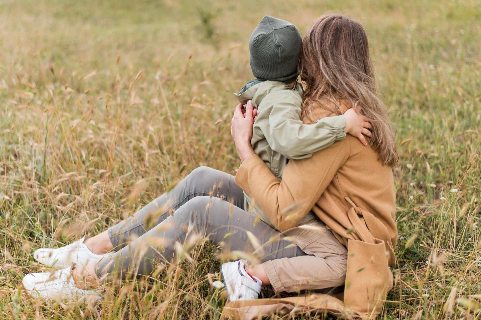 Mom Hugging Child