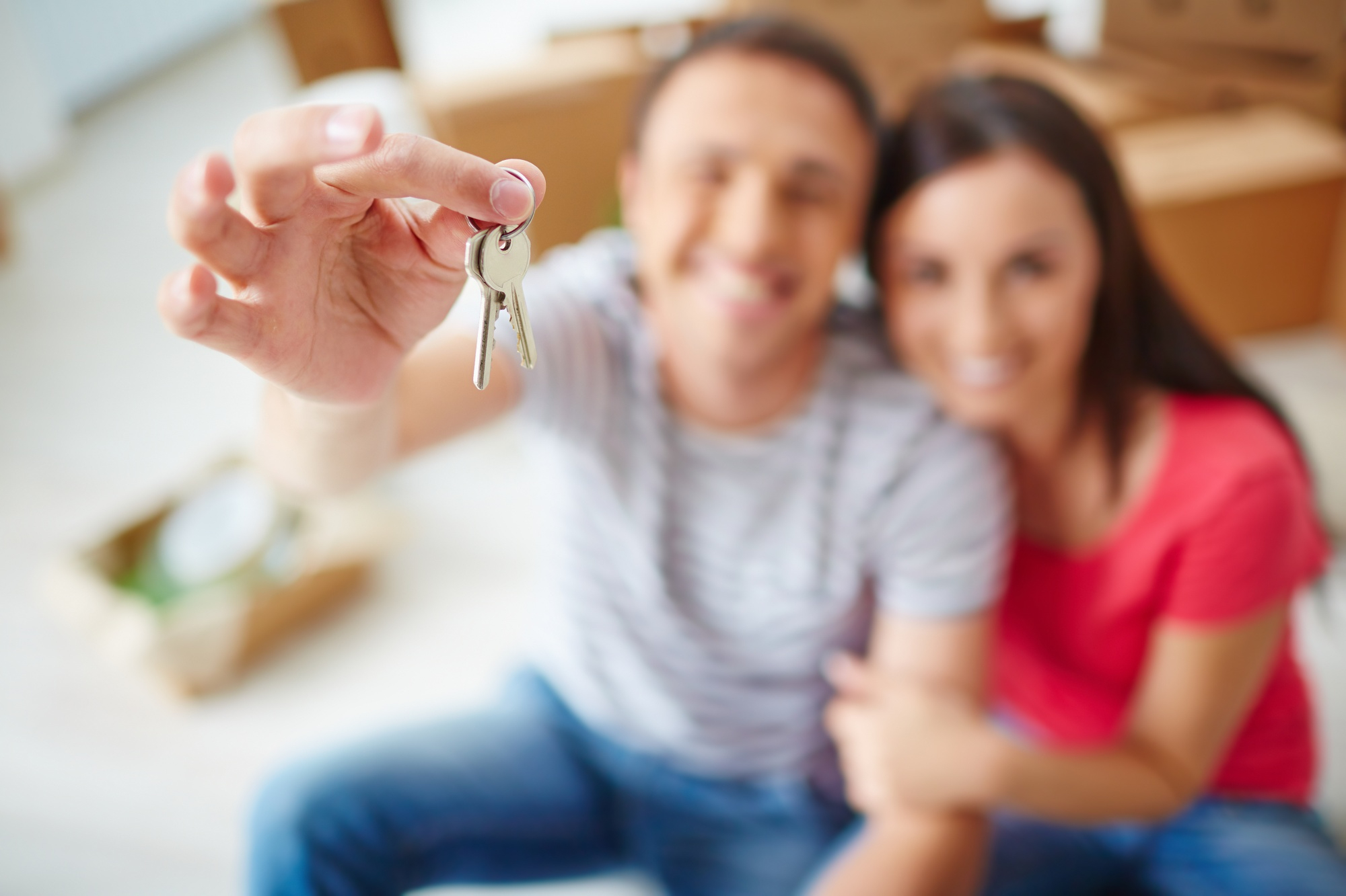 Happy Couple With New House Keys